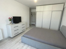 Apartament o camera D Bloc nou Mobilat zona Bucium- Visan