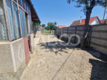 Casa de vanzare 3 camere 90 mpu teren liber 1192 mp in Comun