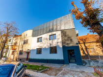 Clădire modernă P+1+M în centrul orașului