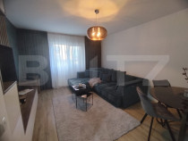 Apartament cu 2 camere, mobilat și utilat + loc de parcare