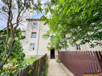 FILM! Apartament 2 camere,decomandat,cu garaj,1.400 mp teren