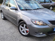 Mazda 3 2.0 benzina 150 de cai,an 2006