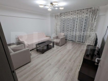 Apartament cu 3 camere, 2 băi, loc de parcare privat, bloc