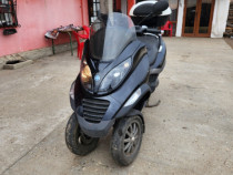 2 motorete piaggio mp3 cu 3 roti Honda amandoua 125