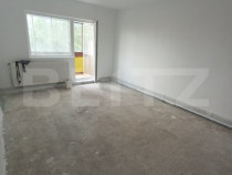Apartament spațios de vânzare - 4 camere, 2 băi, 2 balco