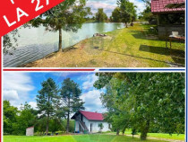 3.7 ha TEREN INTRAVILAN cu CASA si BALTA PESTE