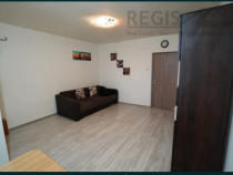 Garsoniera spatioasa Tractorul