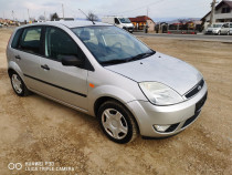 Ford Fiesta Ghia 1,4 i cutie automata