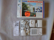 Sistem de alarma combinat pentru usi si ferestre