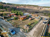 Casuta din lemn,cu 520mp teren intravilan,zona linistita,apr