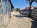 Casa de vanzare 3 camere 90 mpu teren liber 1192 mp in Comun