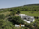 Casă sustenabilă 196 mp cu design futurist, &icirc;n natură, m