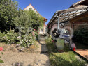 Casa de vanzare cu curte spatioasa loc relaxare si gradina C