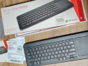 Tastatura Microsoft cu pad.