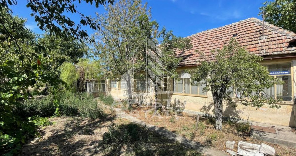 Casa cu teren 3407 mp, la asfalt, seceani, 26 km de timis...