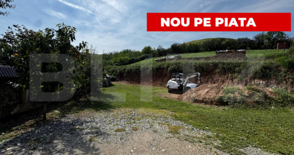 Teren intravilan la sosea asfaltata, 2500 mp, zona sard