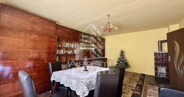 Casa individuala cu 3 camere si anexa, teren 875 mp, bere...