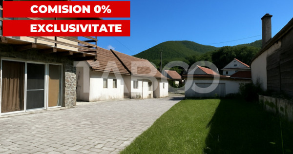 Casa individuala cu 2 corpuri si curte mare in cisnadioara c