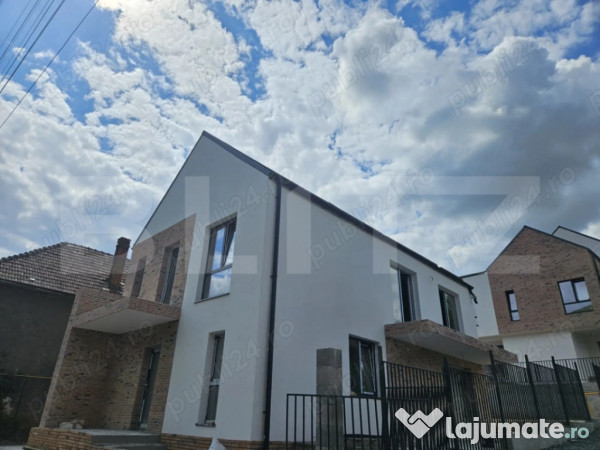 Casa luminoasa 120mp cu living generos, materiale premium si