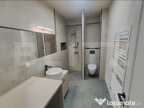 Apartament cu o camera, ultrafinisat, lift, garaj, zona eroi