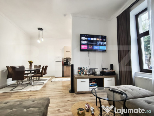 Casa la curte comuna pe 2 nivele , 3 dormitoare central